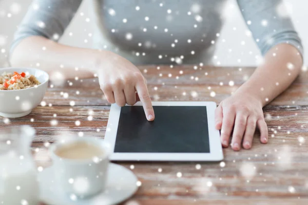 Woman pointing finger to tablet pc computer