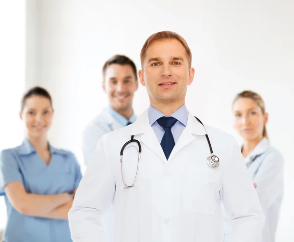 Smiling male doctor with stethoscope