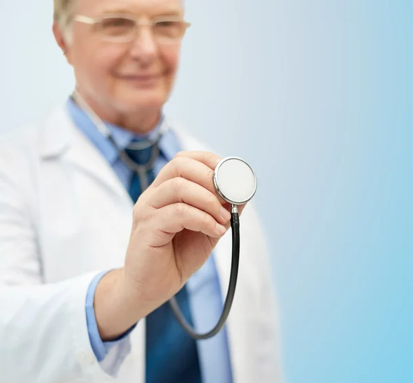 Close up of doctor in white coat with stethoscope