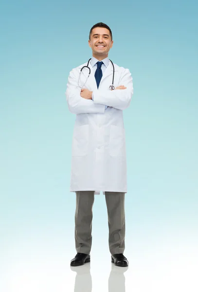 Smiling male doctor in white coat