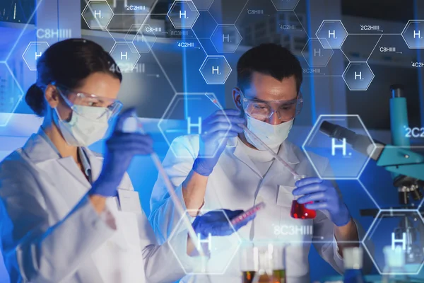 Close up of scientists making test in lab