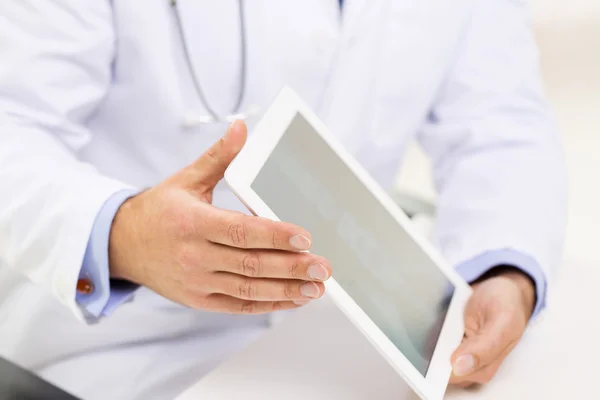 Close up of male doctor hands with tablet pc