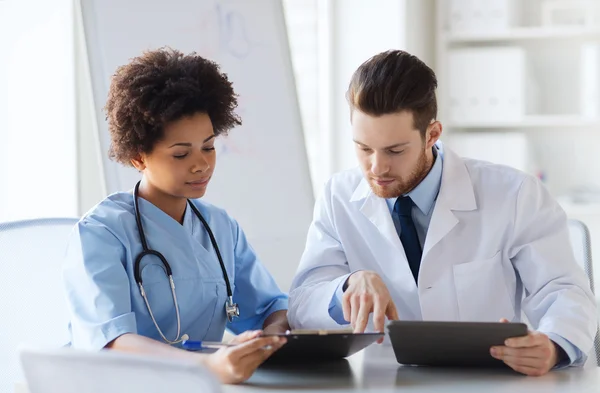 Two doctors meeting at hospital office