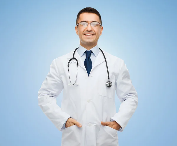 Happy male doctor in white coat s with stethoscope