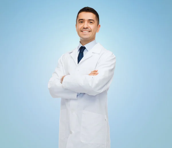 Smiling male doctor in white coat