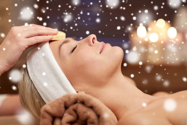 Close up of woman having face cleaning in spa