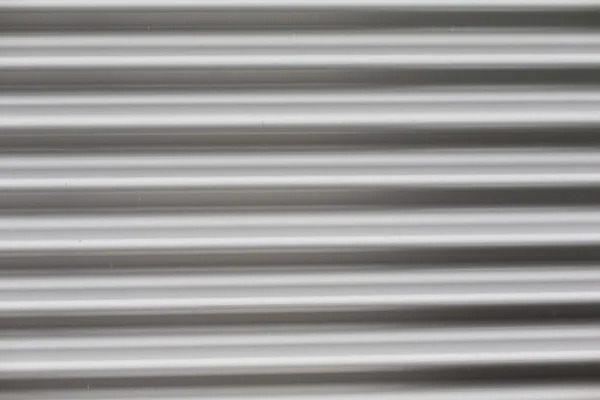 Close up of aluminum metal garage door backdrop