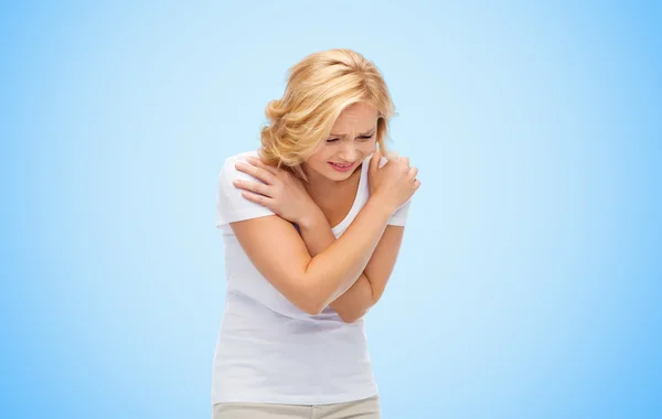 Unhappy woman suffering from pain or violence