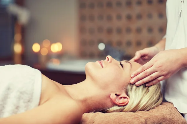 Close up of woman having face massage in spa