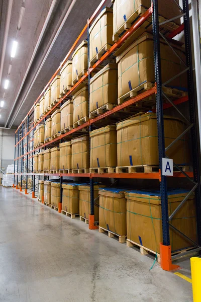 Cargo boxes storing at warehouse shelves