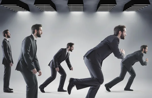 Conceptual picture of running businessmen
