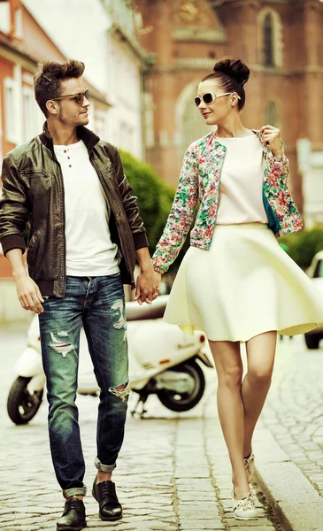 Handsome guy walking with a lovely girlfriend