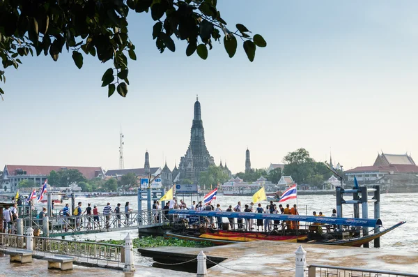 BANGKOK, THAILAND - 10 NOVEMBER: People wait boat on November 10, 2012 in Tha Tien Pier, Bangkok, Thailand