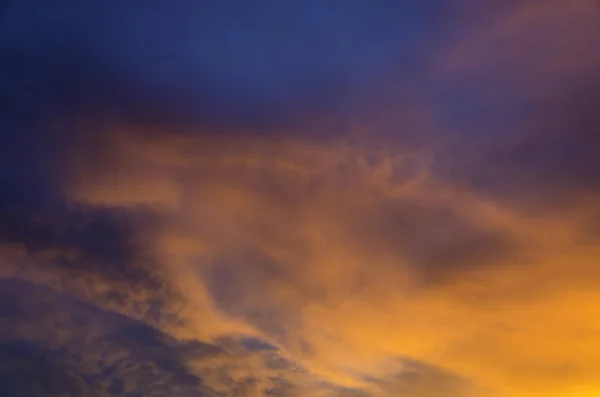 Nice clourful clouds with sunset light in blue sky