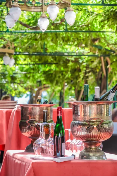 Solemnly laid table with wine glasses