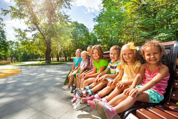 Cute kids on bench