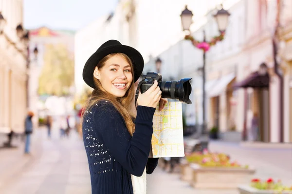 Woman shooting with camera