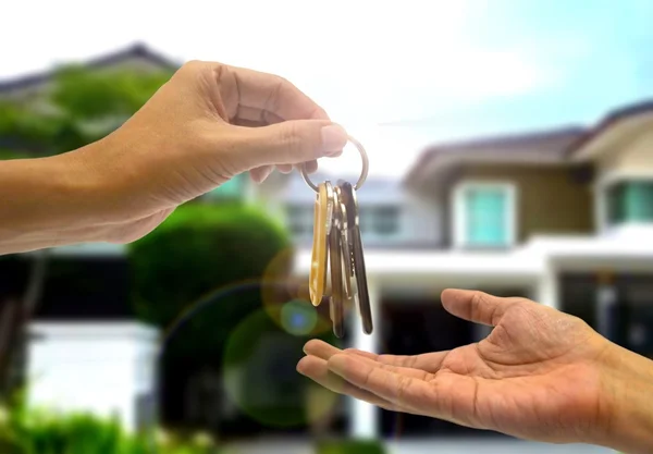 Purchasing  property with two hands and key