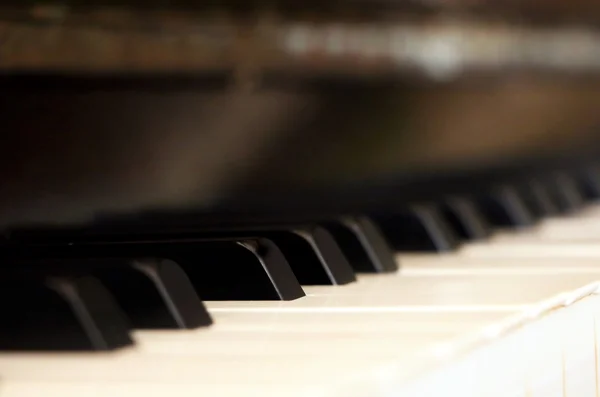 Piano keyboard background with selective focus