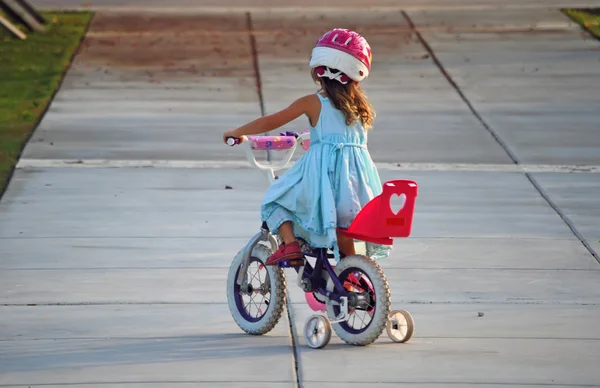 Toddler Learning to Ride a Bicycle