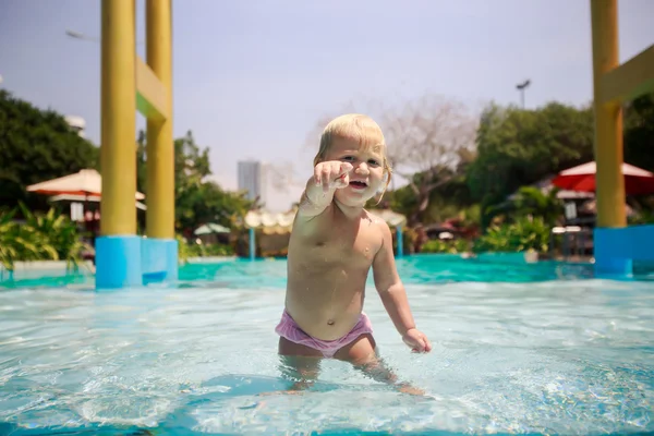 Small girl in swimming pool