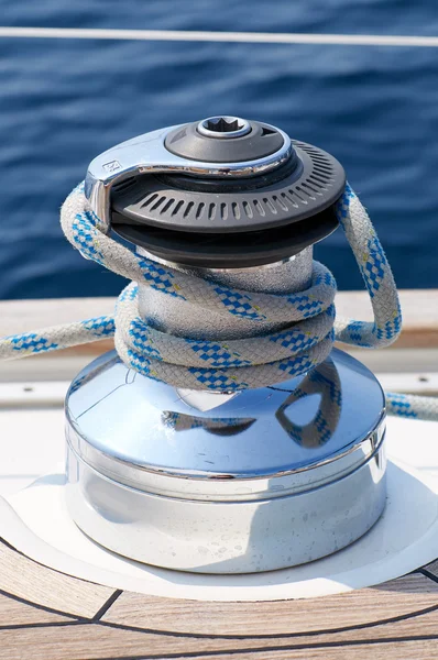 Blue rigging on board the yacht at sea