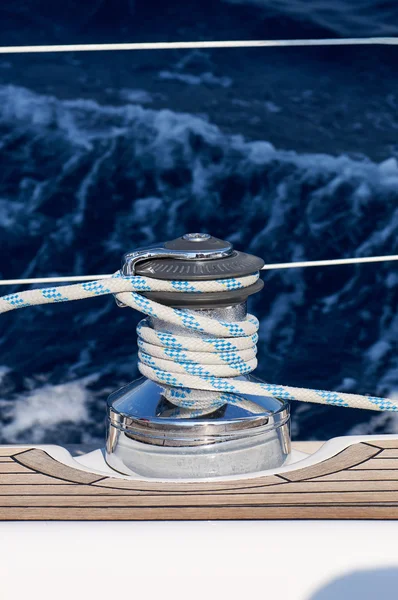 Blue rigging on board the yacht at sea