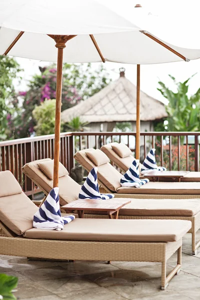 Luxury swimming pool and deck chair at the resort