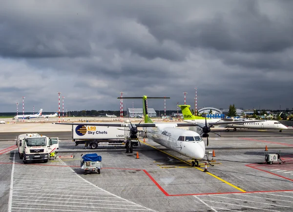Preflight service of the plane of airline Airbaltic at the Riga International Airport