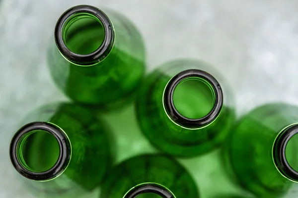 Group of Green Opened Bottles