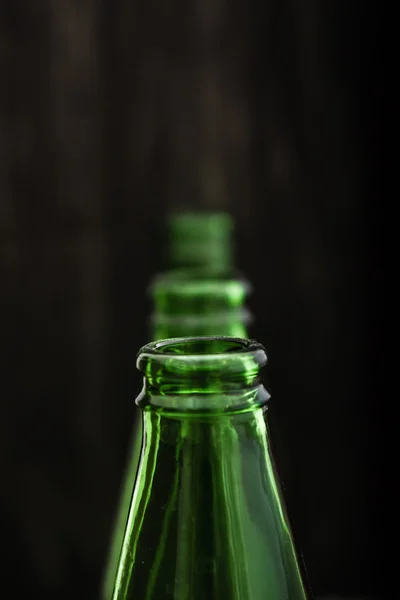 Group of Dirty Green Opened Bottles