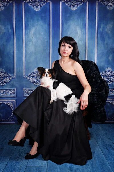 Elegant lady with a dog