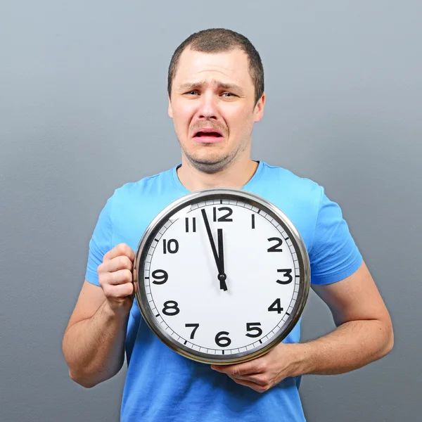 Portrait of man afraid of getting late concept