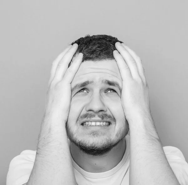 Portrait of sad man looking up - Monocrome or black and white po