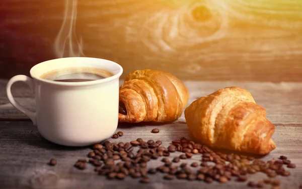 Coffee and fresh croissant