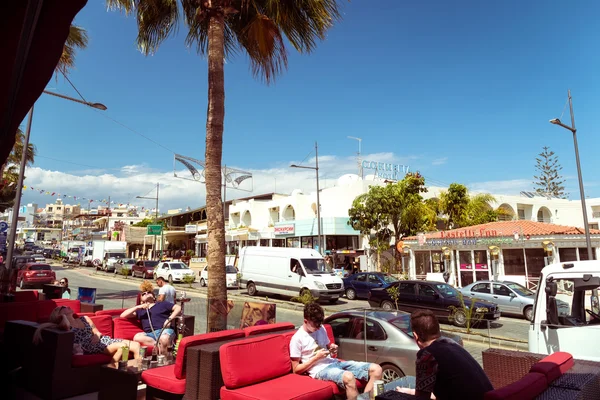 AYIA NAPA, CYPRUS - MAY 06, 2016: People at an open-air cafe