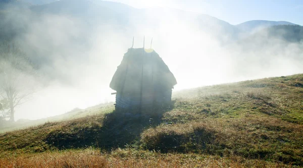 Small cottage in the mountains-panoramic view