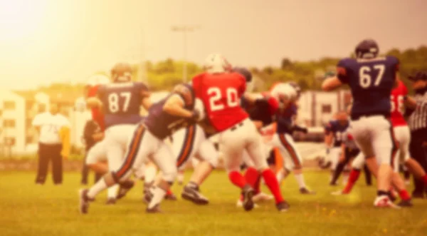 Blurred background of american football game