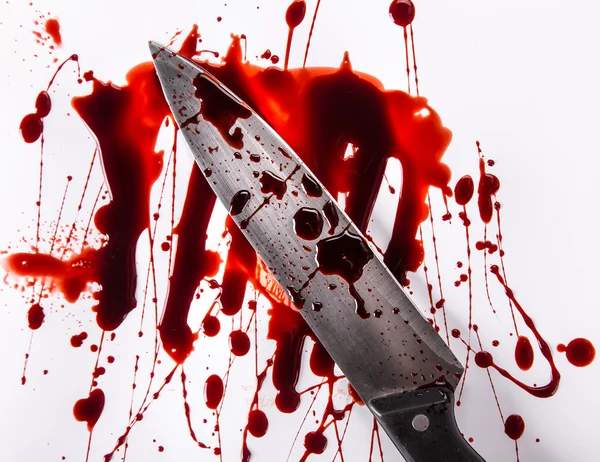 Murder concept - knife with blood on white background
