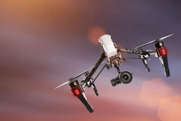 Drone with 4K camera flying.