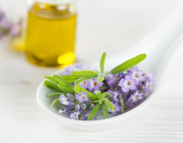 Wellness treatments with lavender flowers.