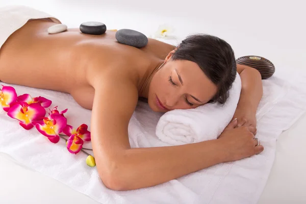 Young woman getting spa procedures.