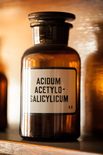 Old vintage medicine bottles, close-up.