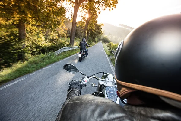 The view over the handlebars of motorcycle