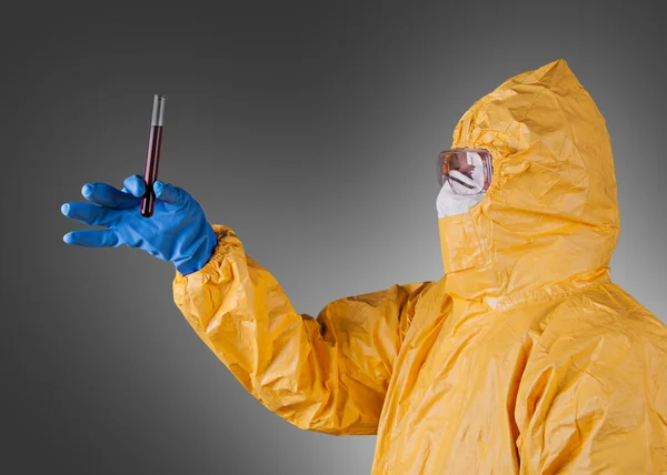 Scientist with protective yellow suit