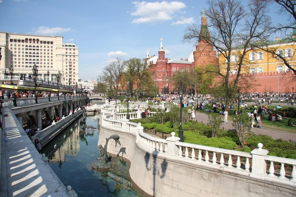 People walk in Alexander Garden of Moscow Kremlin