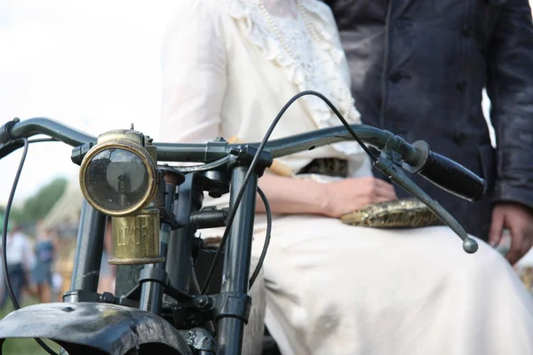 Vintage couple at the motorcycle