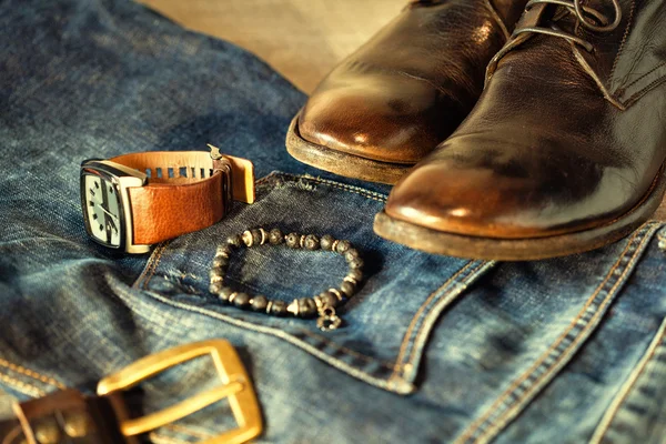 Still life with casual man, shoes, jeans and accessories