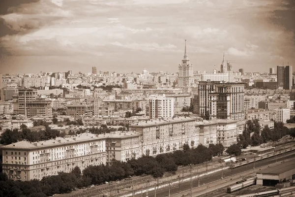 Moscow - city landscape, the historical part of the city, railroad in the foreground. Photo toned in sepia