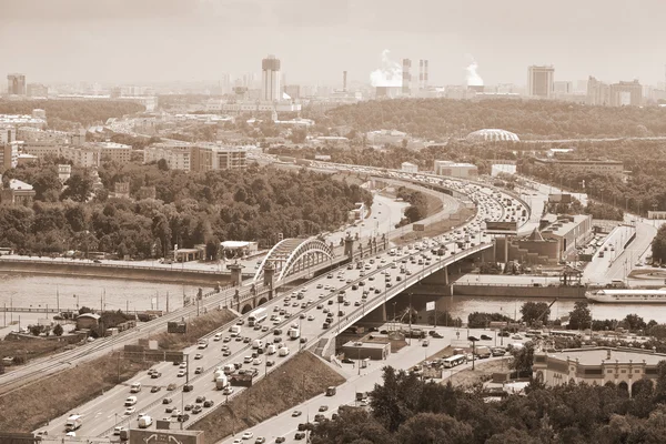 Moscow - city landscape, the Third Ring Road. Life of the big city. Photo toned in sepia